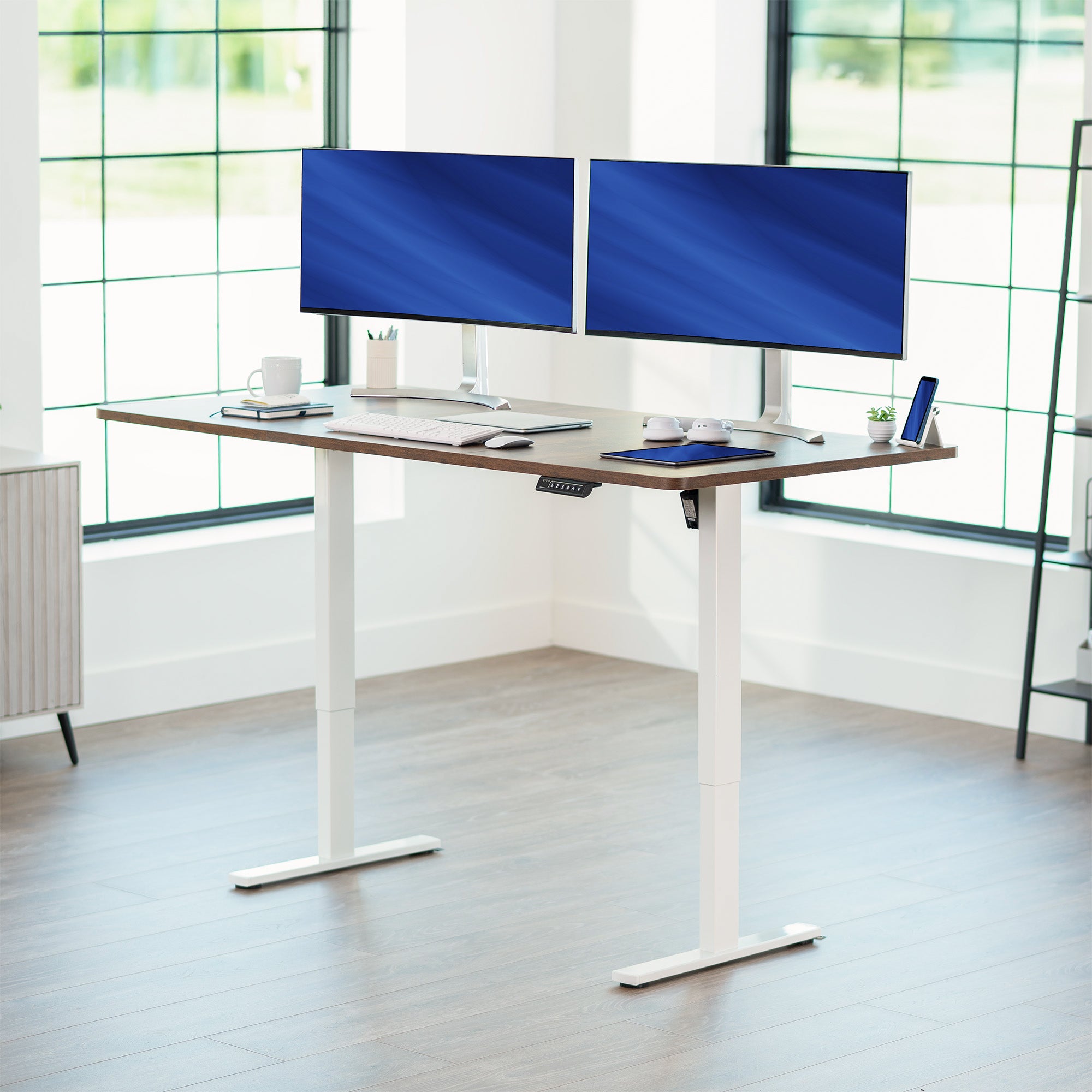Large sturdy sit or stand modern desk with electric height adjustment options.