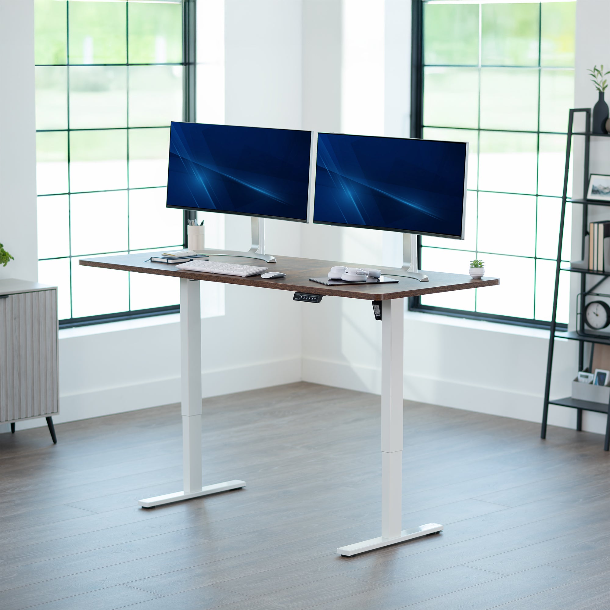 Large sturdy sit or stand modern desk with electric height adjustment options.
