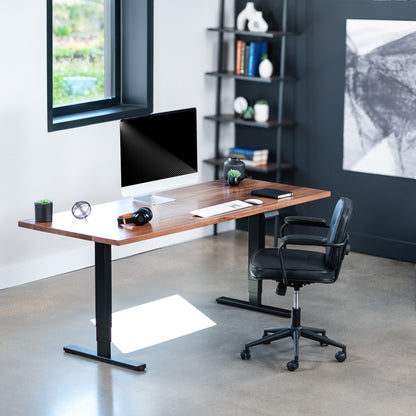 Solid walnut top spacious height adjustable electric desk with smart control panel.