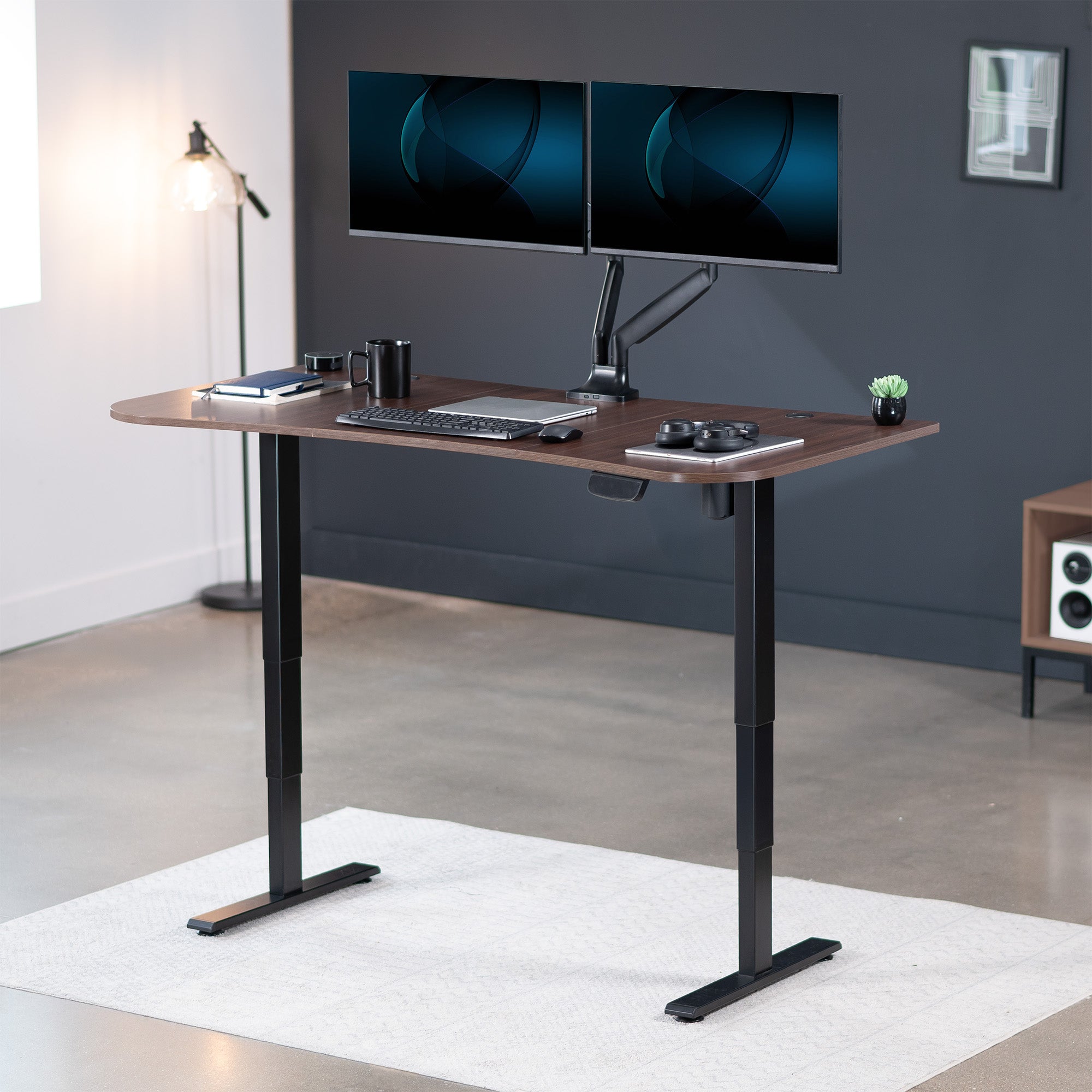 63” x 32” Electric Height Adjustable Stand Up Desk in Modern Office Space