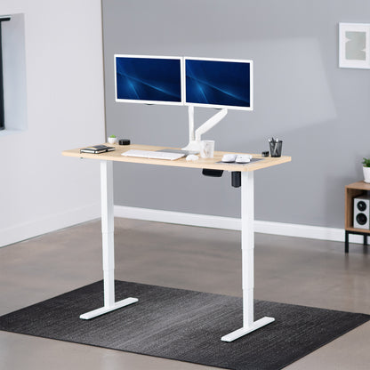 Heavy-duty electric height adjustable desktop workstation for active sit or stand efficient workspace.