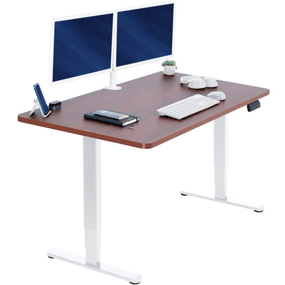 Wooden desk with white legs, two computer monitors, keyboard, and mouse on a white background