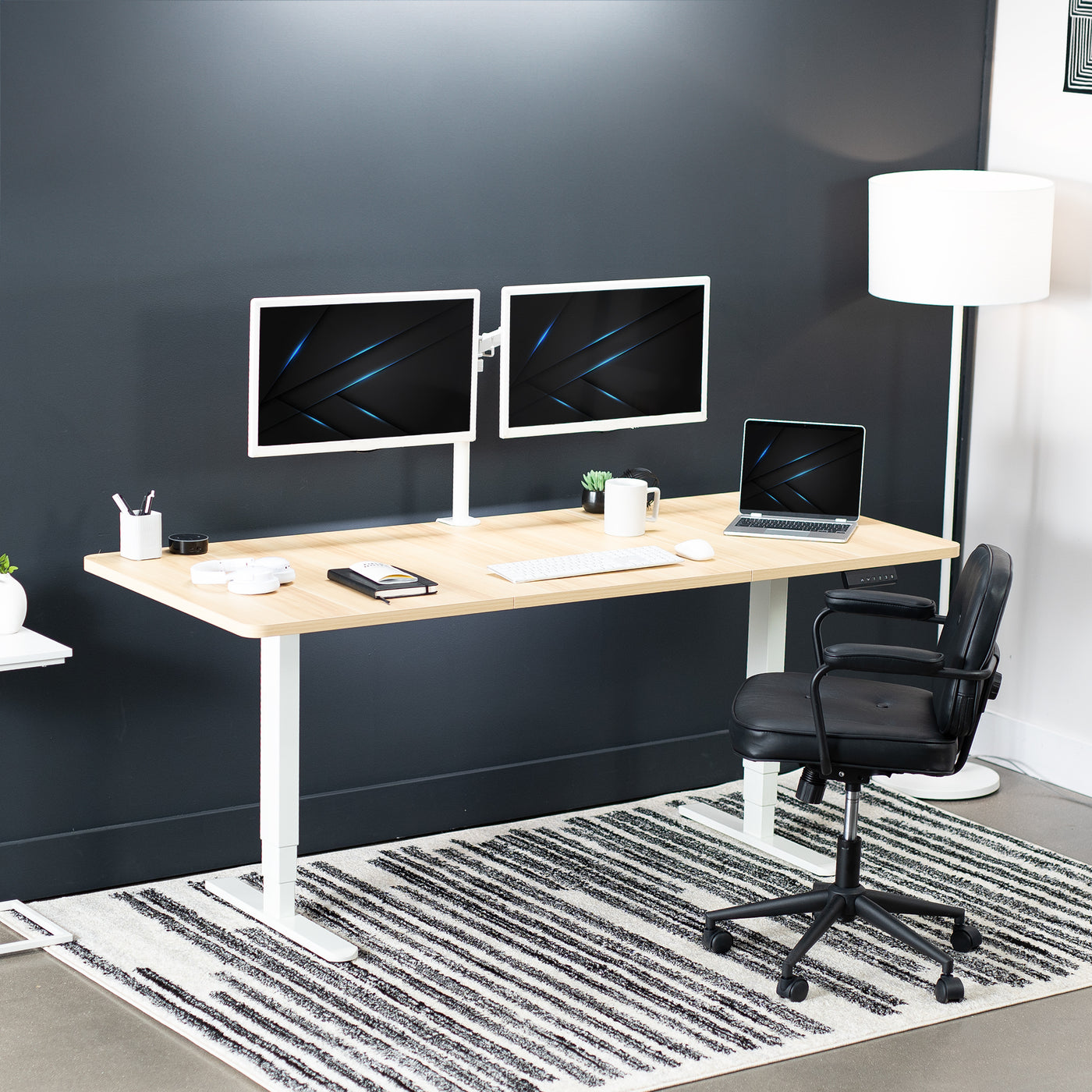 Large sturdy sit or stand active workstation with adjustable height using a memory control panel.