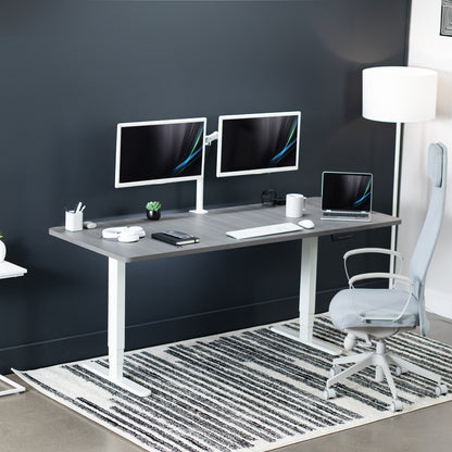 Large sturdy sit or stand active workstation with adjustable height using a memory control panel.