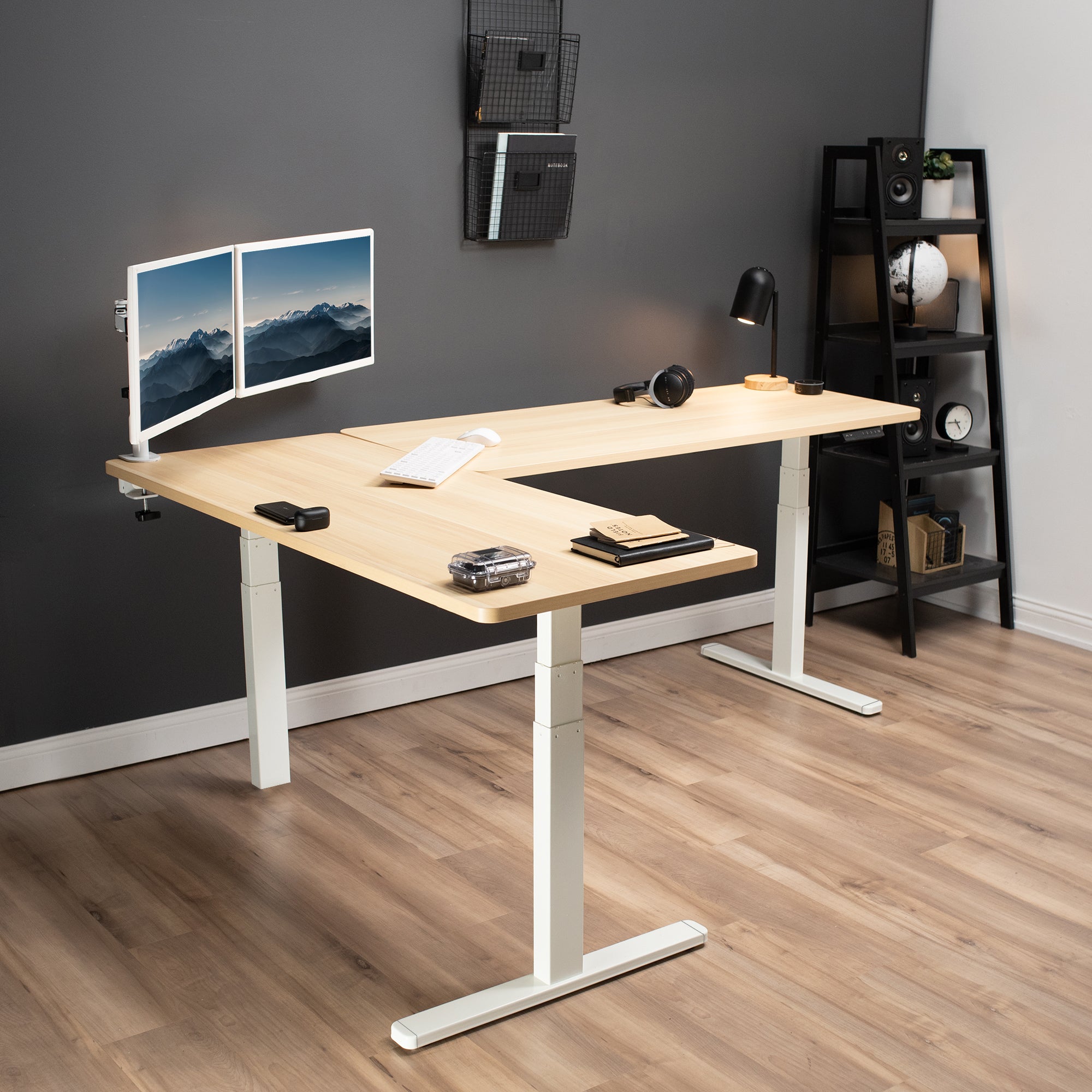 Large sturdy height adjustable corner desk workstation with memory controller.