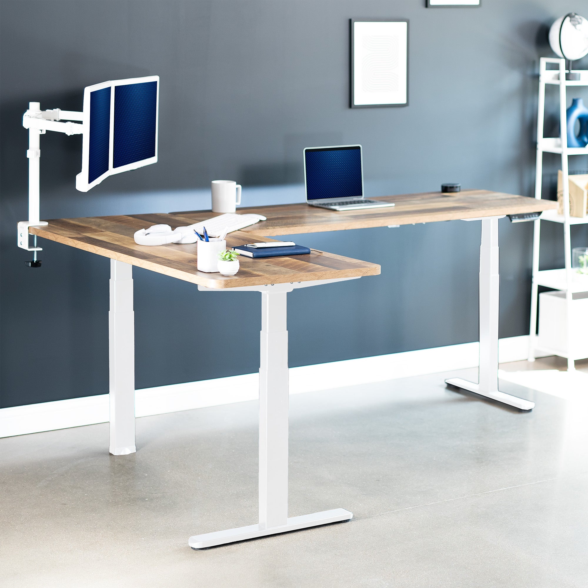 Large sturdy height adjustable corner desk workstation with memory controller.