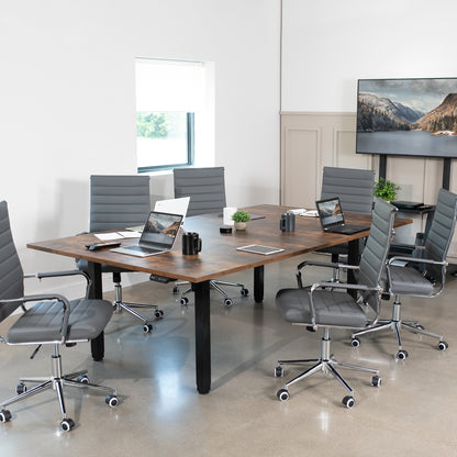 Dual Motor Electric 4-Leg Desk with Square Corner Top provides a spacious workstation for a conference room or project table and creates smooth height adjustment at the push of a button.