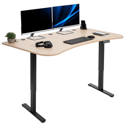 Heavy-duty electric sit to stand height adjustable ergonomic desk workstation with programmable memory controller for convenient productive workspace.
