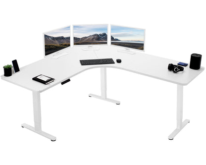 Large heavy-duty electric height adjustable corner desk workstation with programmable memory controller.