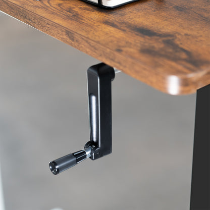 Compact steel desk frame with brown desktop and a dual monitor mount.