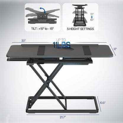 A black tilting keyboard riser with a mouse on top and the ability to adjust the angle of the keyboard surface with measurement icons. 