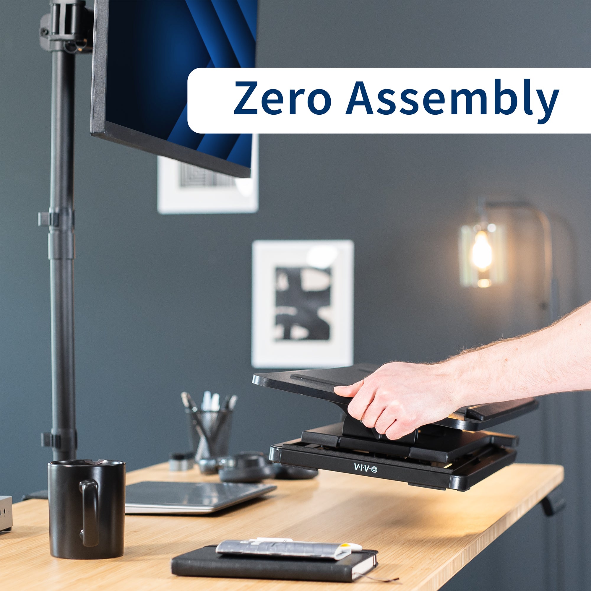 A black tilting keyboard riser that requires no assembly. 