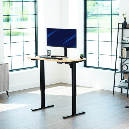 Light Wood 43in x 24in Particle Board Table Top on black frame in office setting