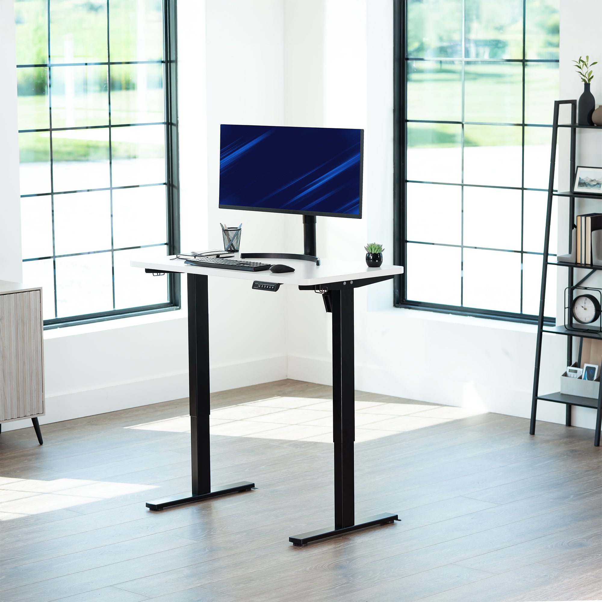 White 43in x 24in Particle Board Table Top on black frame in office setting