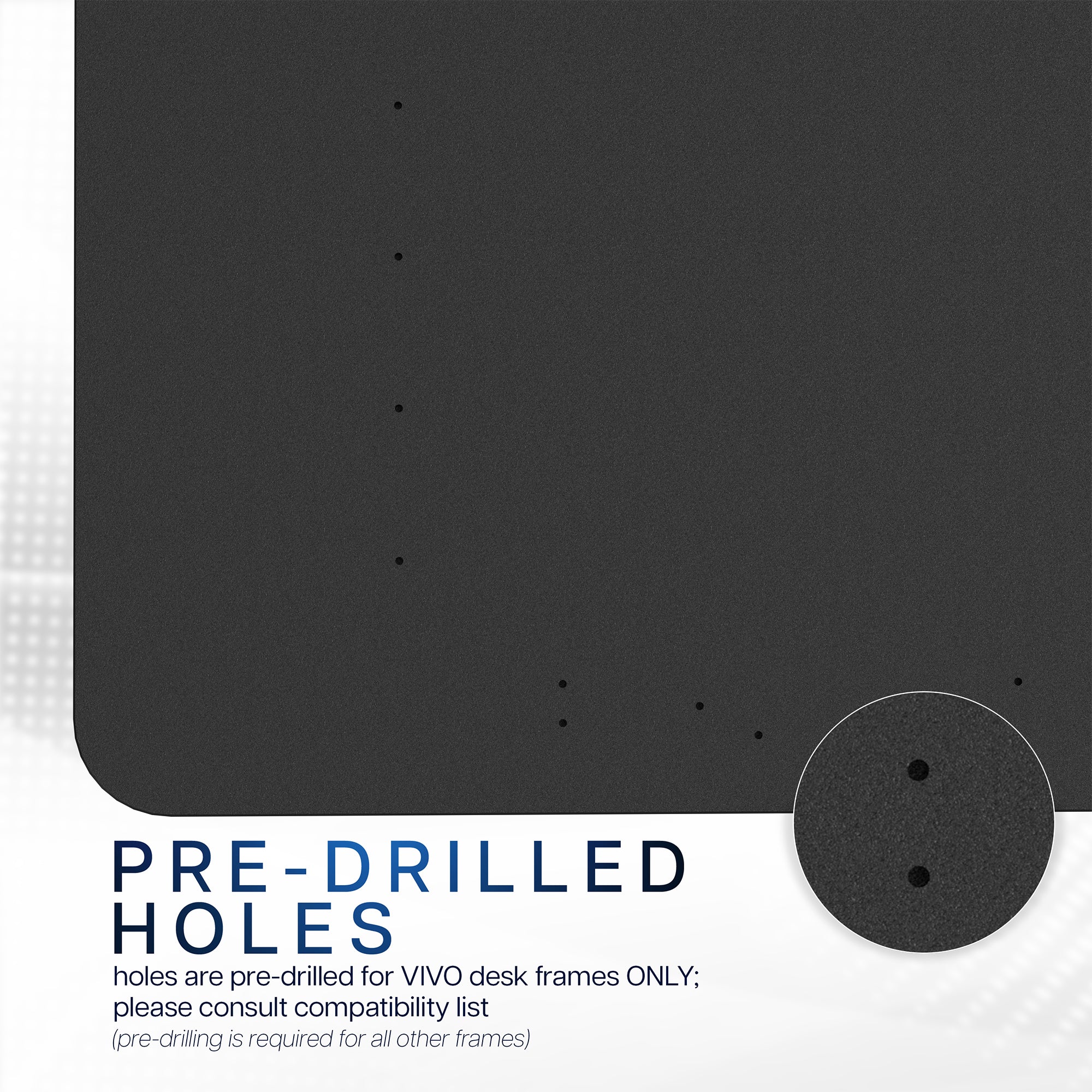 Black desktop with pre-drilled holes for VIVO desk frames on a white background