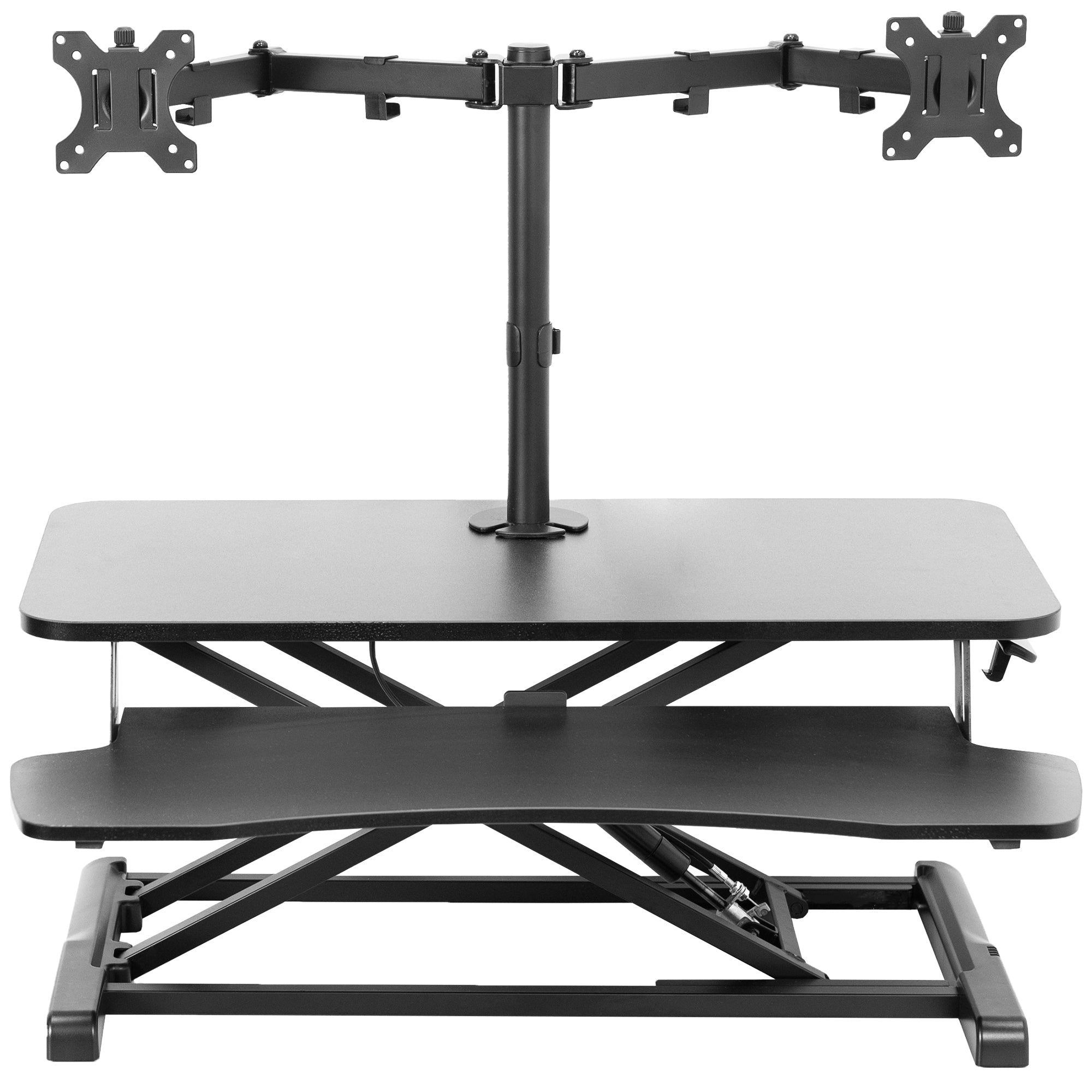 Sturdy height adjustable desk converter with articulating dual monitor mount.