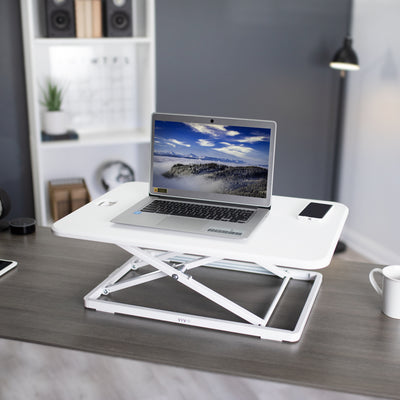 Ergonomic height adjustable desk converter monitor riser.