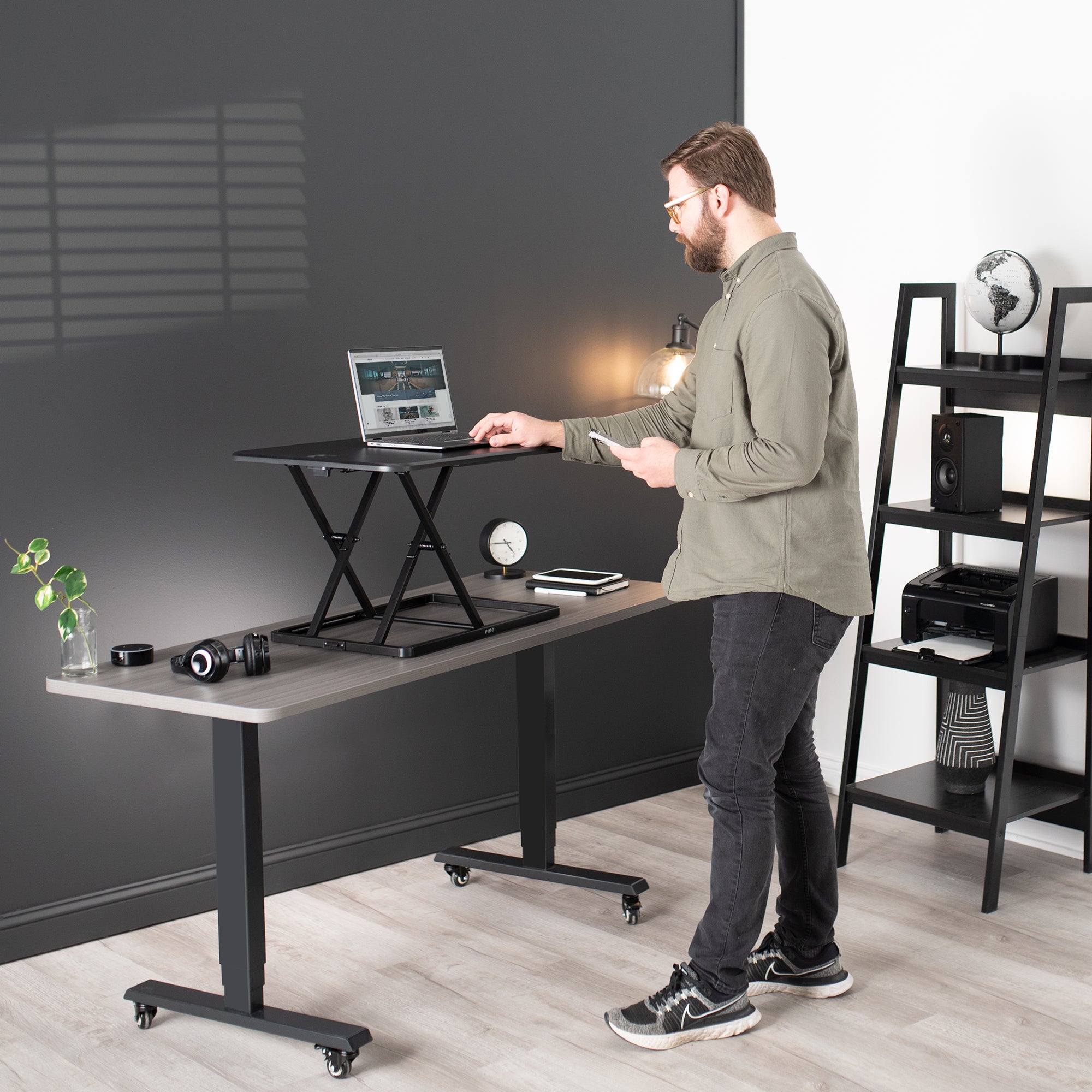 Ergonomic height adjustable desk converter monitor riser.