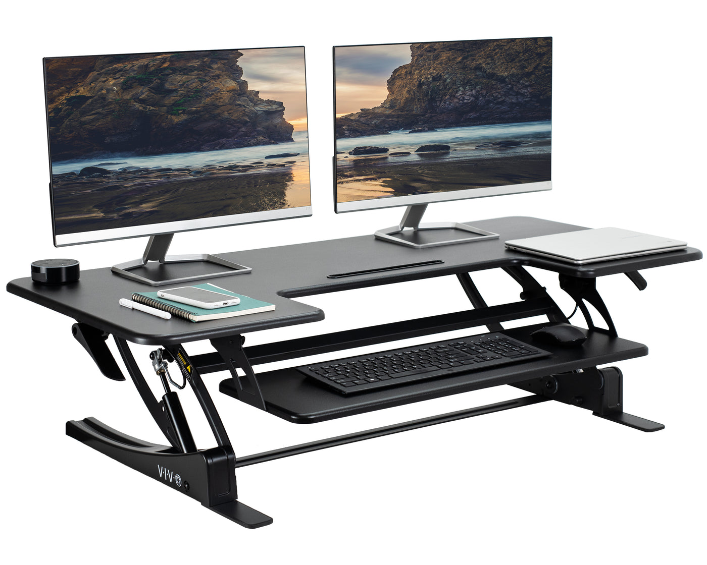 Heavy-duty height adjustable desk converter monitor riser with two tiers.