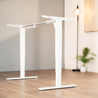Heavy-duty sit or stand desk frame with adjustable height using touch screen control panel.