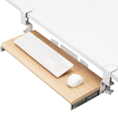 Sleek design with C-clamps and sliding tray for a clean and tidy workstation.