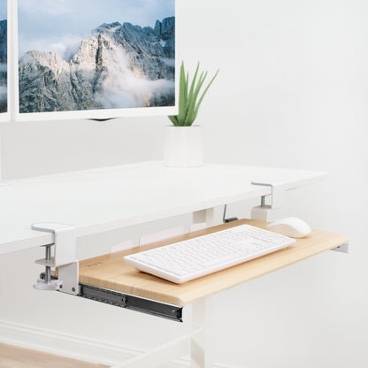 Sleek design with C-clamps and sliding tray for a clean and tidy workstation.