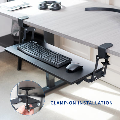 Ergonomic convenient under desk clamp-on keyboard tray with swinging height adjustment.