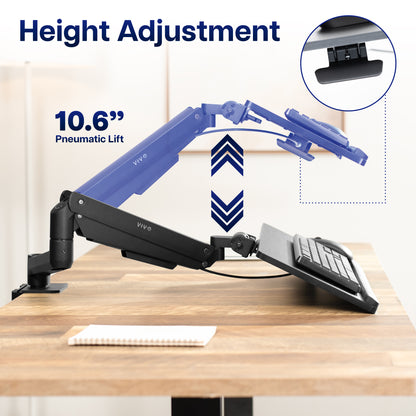 Height adjustment mechanism with pneumatic lift shown on keyboard tray on a blurred background