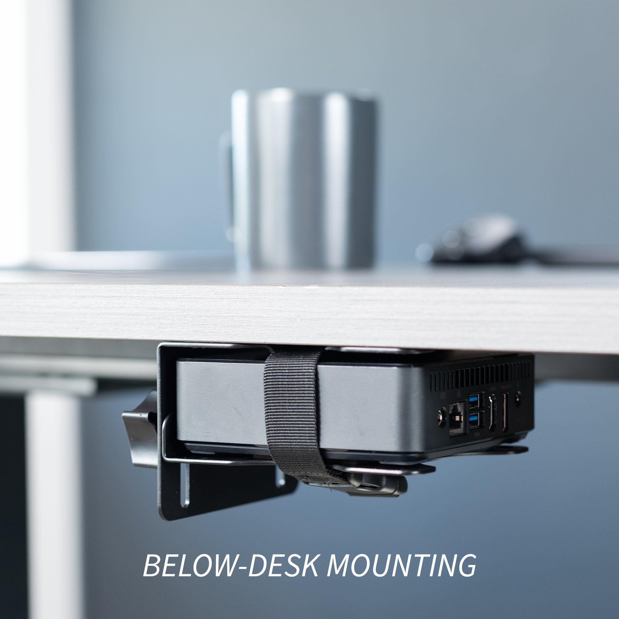 Sturdy steel multi-functional PC mount for under desk, pole, or behind monitor VESA mounting.