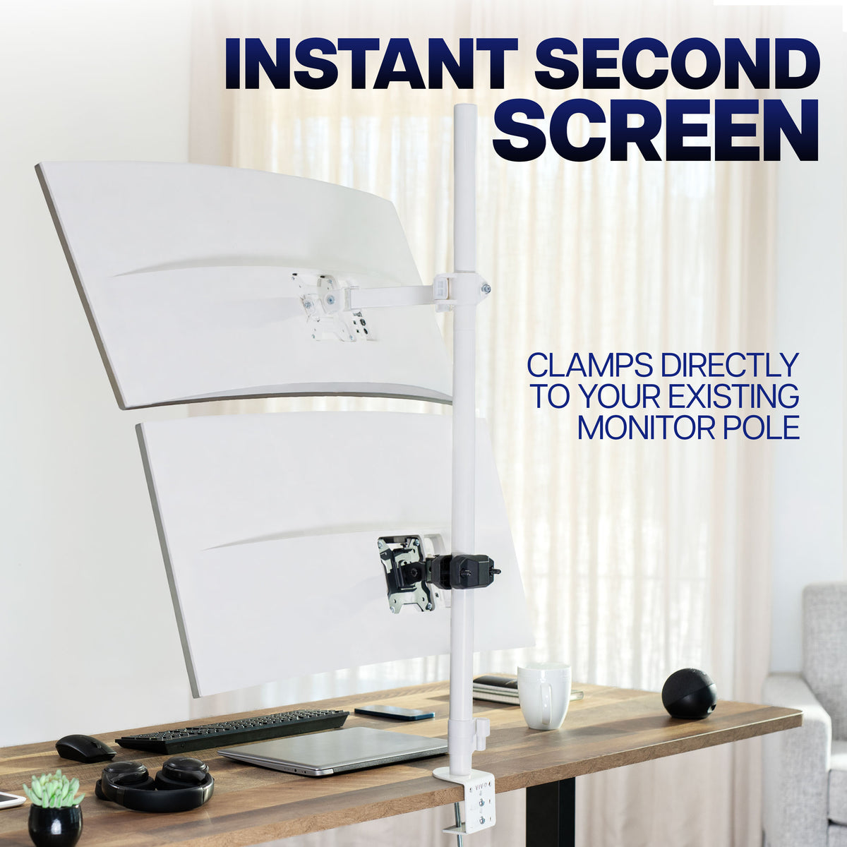 VESA pole mount adding a second screen to a workstation without taking up additional desk space