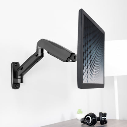 Sturdy adjustable pneumatic arm single monitor ergonomic wall mount for office workstation.