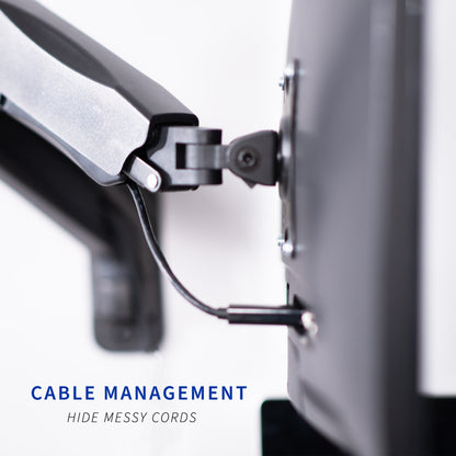 Sturdy adjustable pneumatic arm single monitor ergonomic wall mount with integrated cable management.