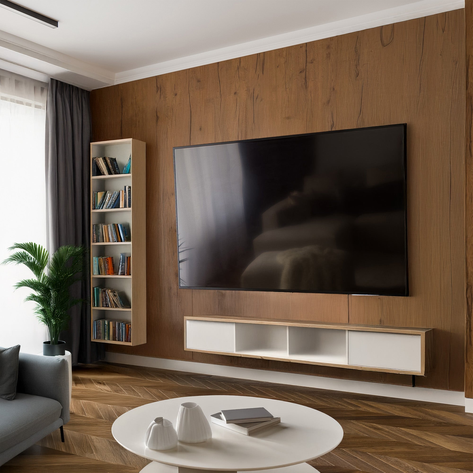 TV mounted to wall in home office setting.