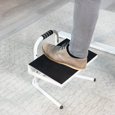 Adjustable footrest designed for workers who sit or stand all day with little ergonomic support.