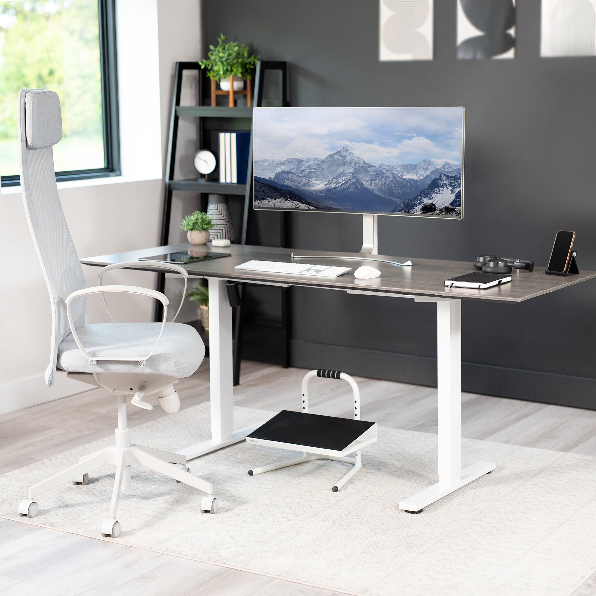 Adjustable footrest designed for workers who sit or stand all day with little ergonomic support.