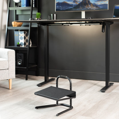 Adjustable footrest designed for workers who sit or stand all day with little ergonomic support.