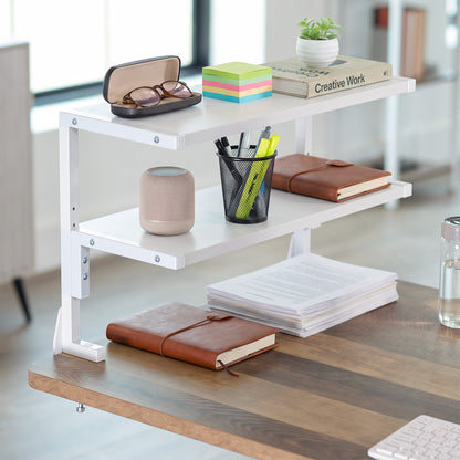 White wide spacious above desk or below desk clamp-on shelf with two shelves for convenient storage and organization. Lower shelf height adjusts.