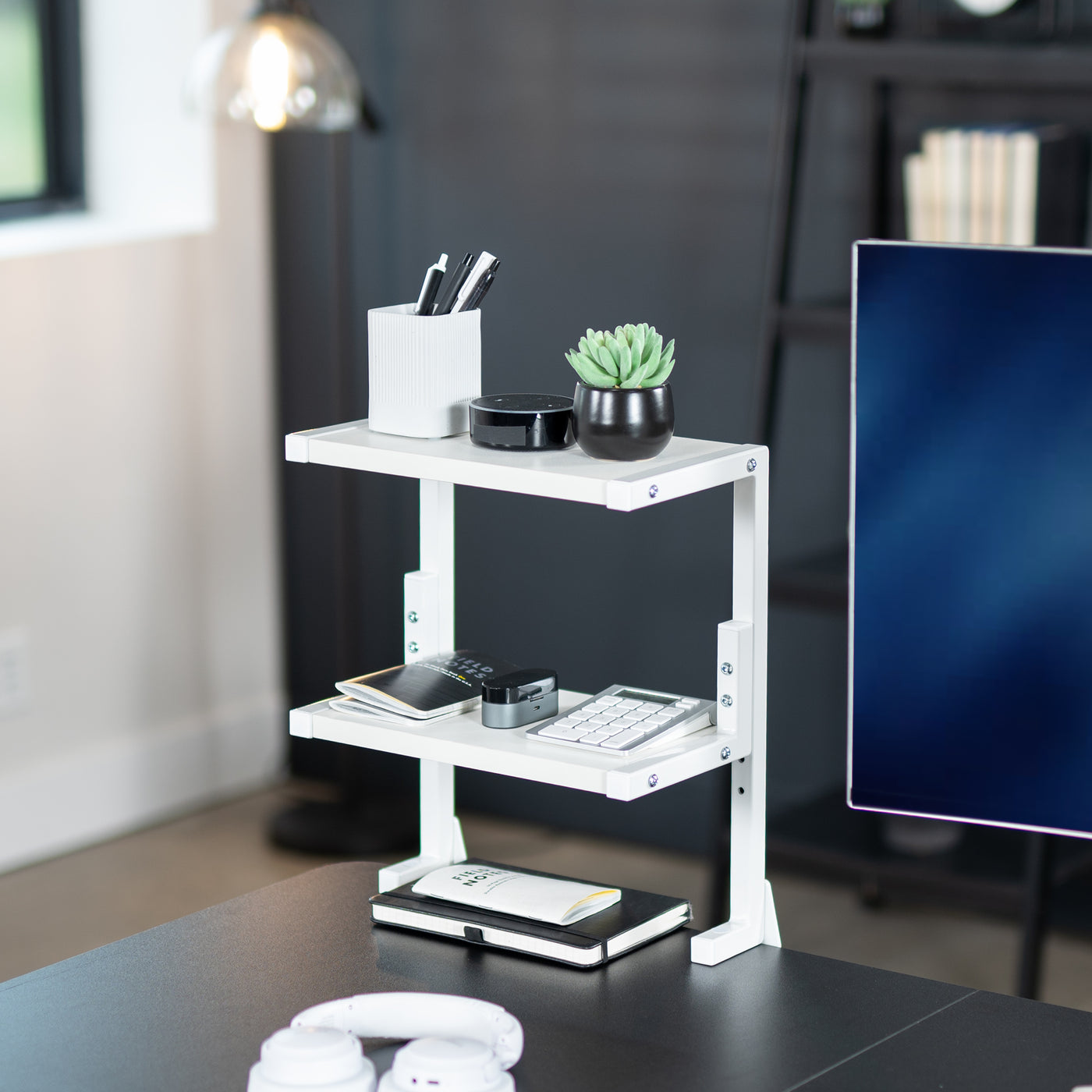 Elevate items on your desktop in an organized manner to create more desktop surface space.