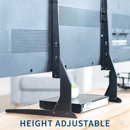 Height adjustable TV stand with a blurred office background