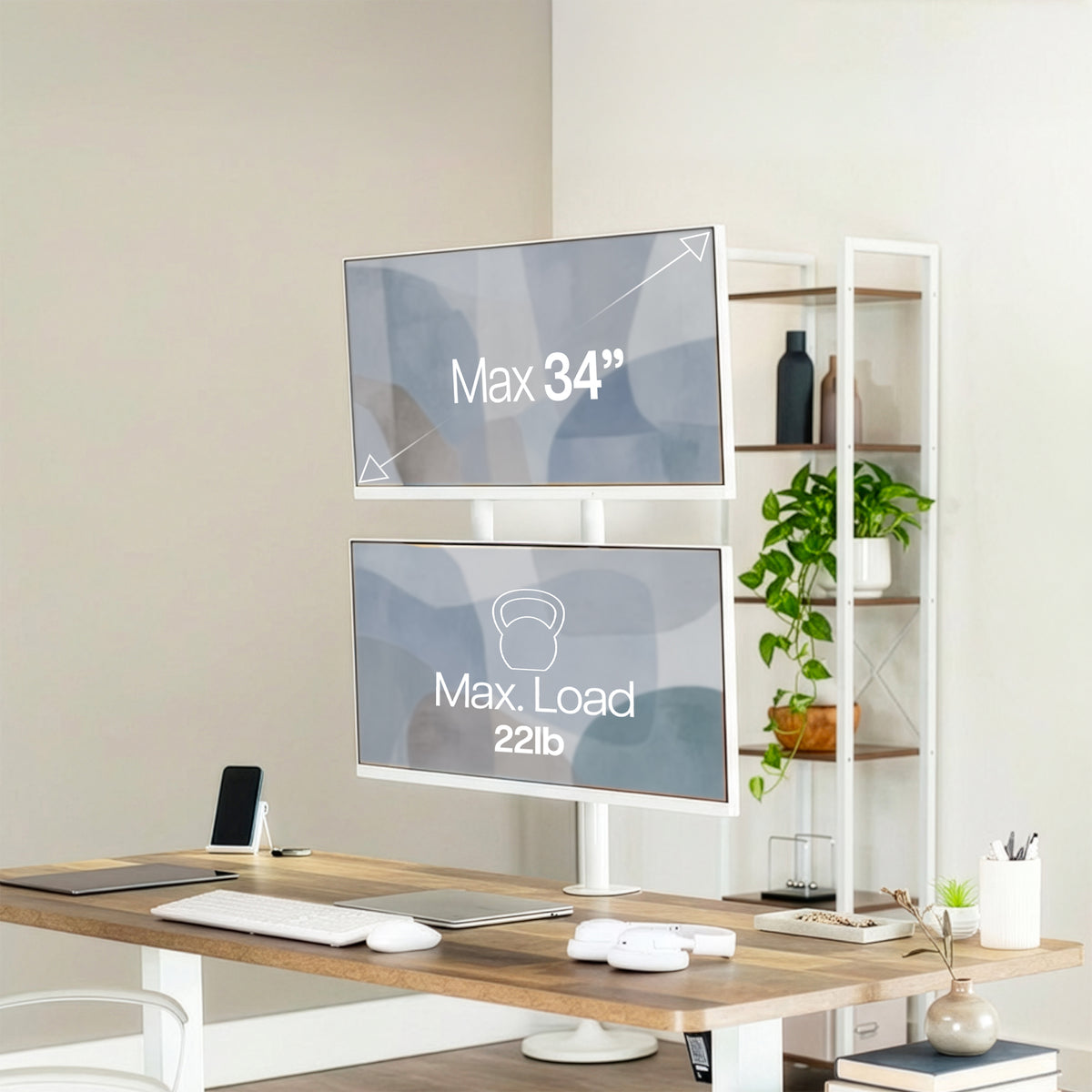 White extra tall dual monitor stand on a desk in a home office setting