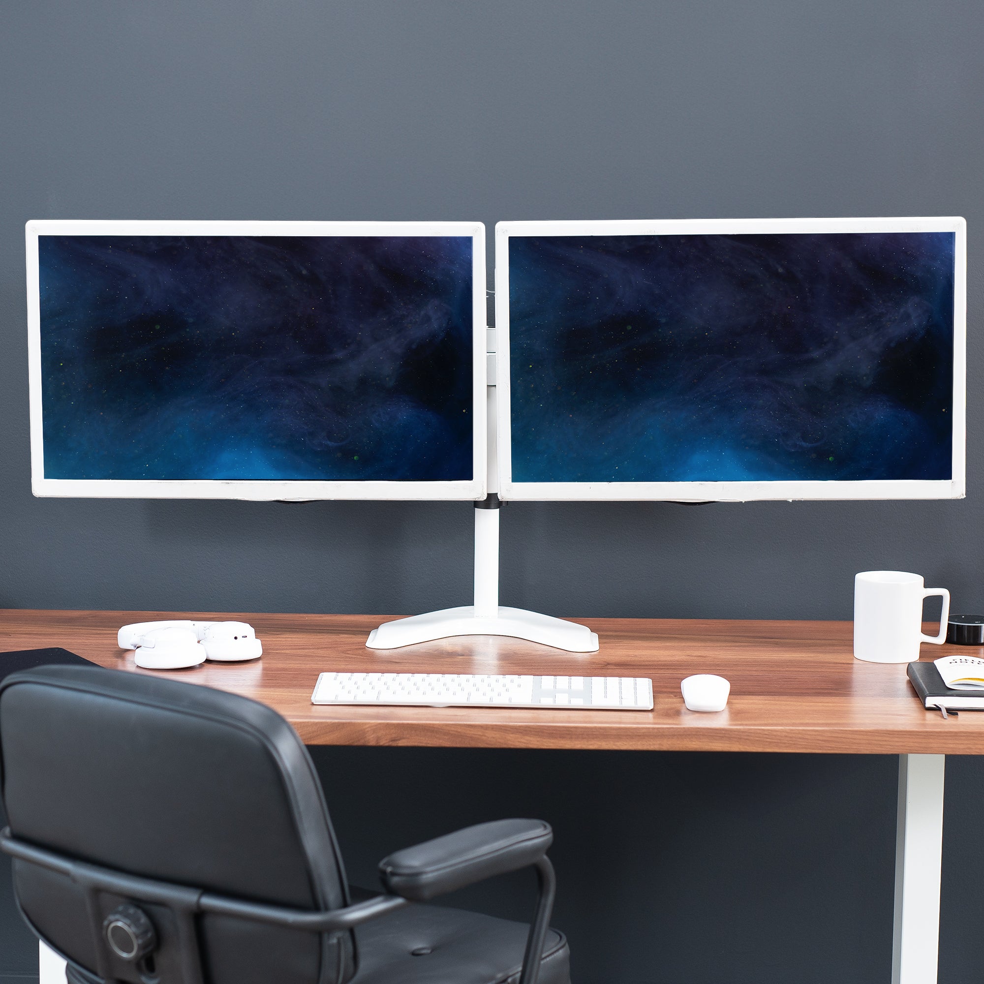 Enjoy ergonomic viewing angles with our freestanding dual monitor stand. 