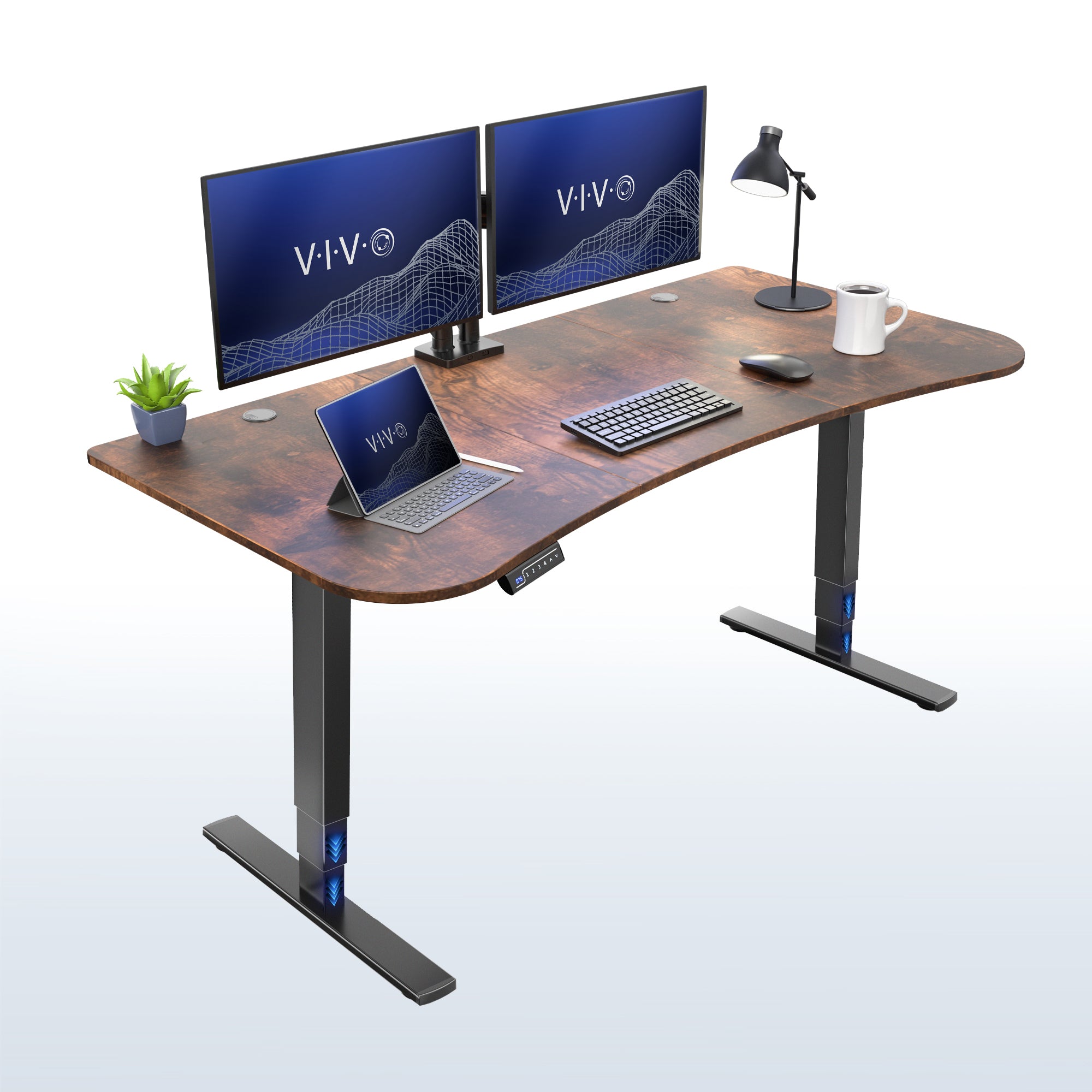 63” x 32” Electric Height Adjustable Stand Up Desk. Features a built-in power strip.