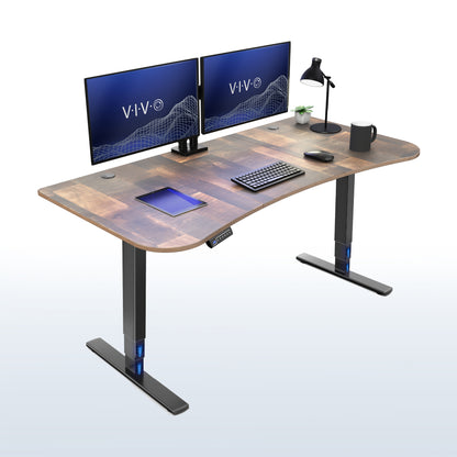 63” x 32” Electric Height Adjustable Stand Up Desk. Features a built-in power strip.