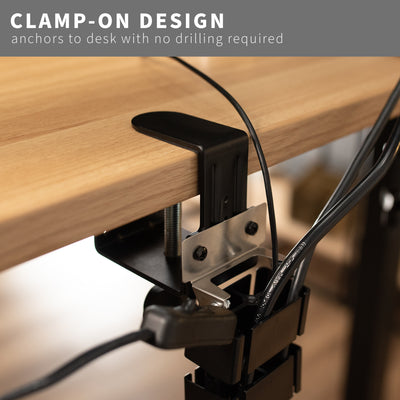 Clamp-on  vertebrae cable management that anchors to desk with no drilling required.