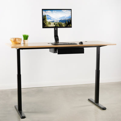 Standing desk with a mounted desk organizer.