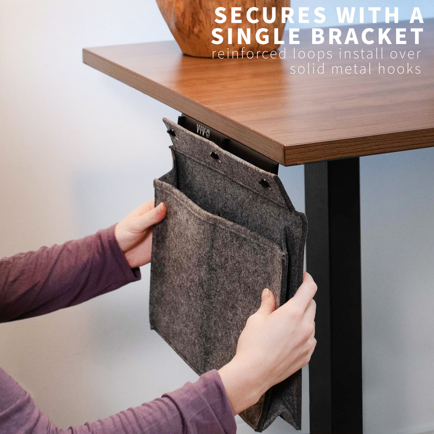 Easy installation by securing a single bracket underneath the desk.