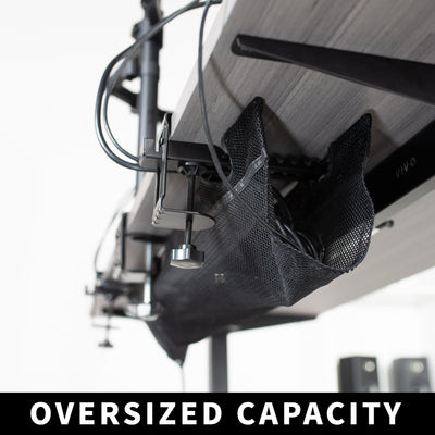 Oversized capacity holding a plethora of cords out of the way and keeping an office space organized.
