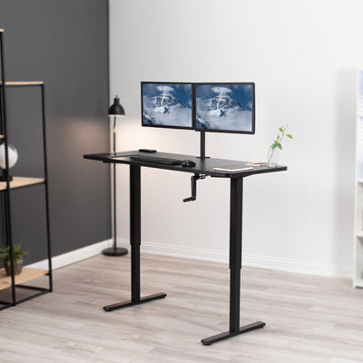 Desk placed diagonally in a modern office room supporting a dual monitor mount.