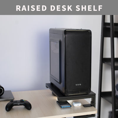 Elevate your PC off the ground and store smaller objects beneath the clamp on the shelf.