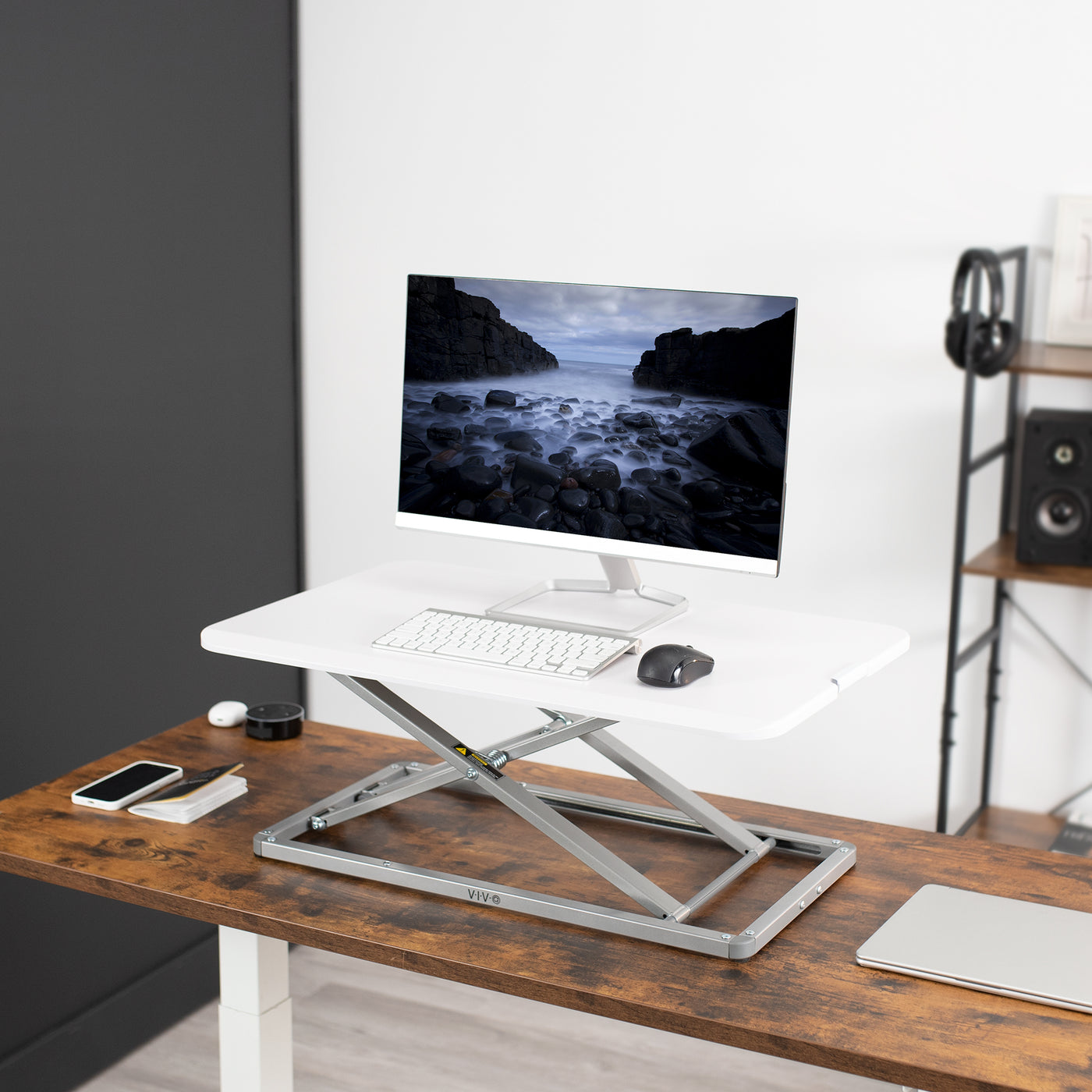Heavy-duty height adjustable desk converter monitor riser.